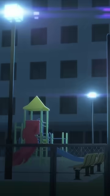 夜の公園の遊具とアパートメント