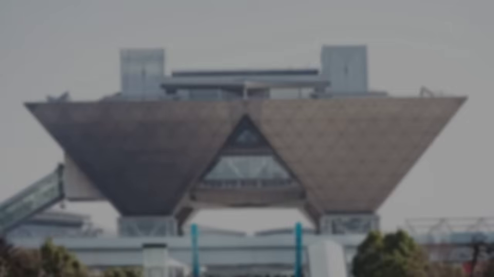 ぼやけた巨大なイベント会場の建物