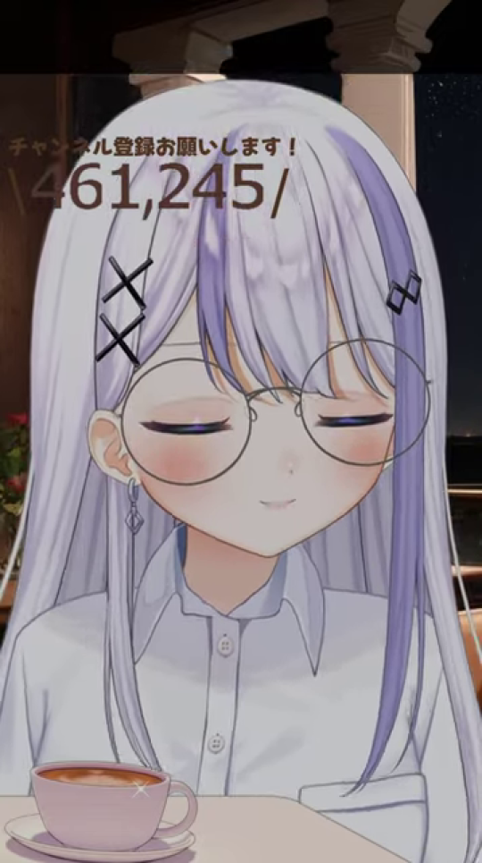 - 配信開始時のののちゃん。落ち着いた表情と夜景の背景が「世界一のんびりできる配信」のコンセプトを視覚的に示しており、配信の導入部とテーマを読者に伝えるのに最適です。